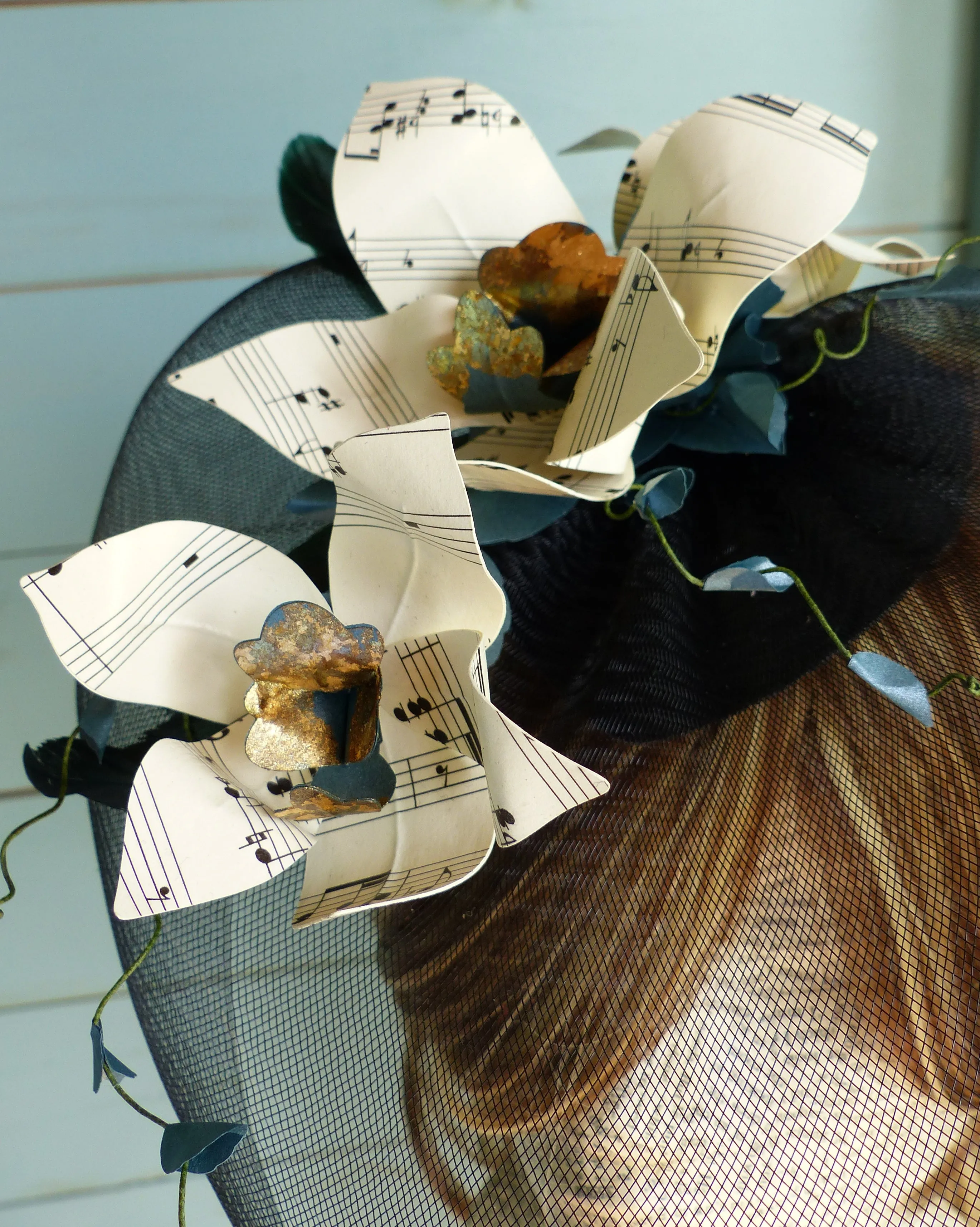 Paper orchid sheet music flower fascinator hair accessory