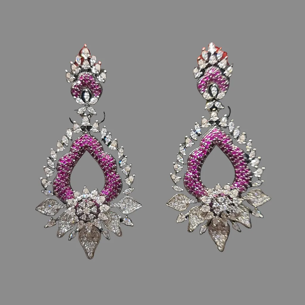 "Shimmering Elegance: Silver-Plated Stone-Studded Danglers for a Touch of Glamour"